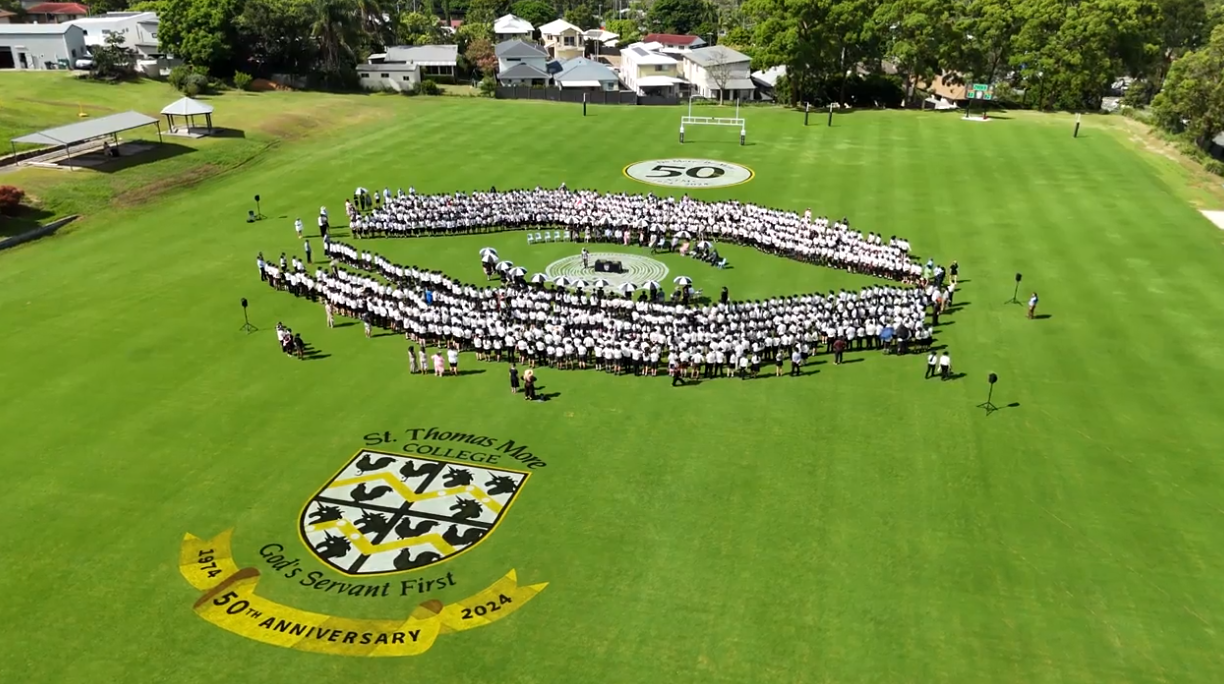 STMC 50th Anniversary gathering on the college oval.png