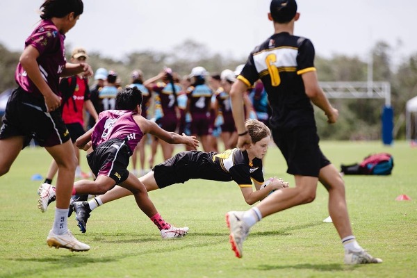 stmc student scoring try at touch football.jpg