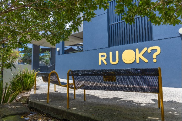 school seating area with RUOK message, highlighting student wellbeing, support and a culture of care